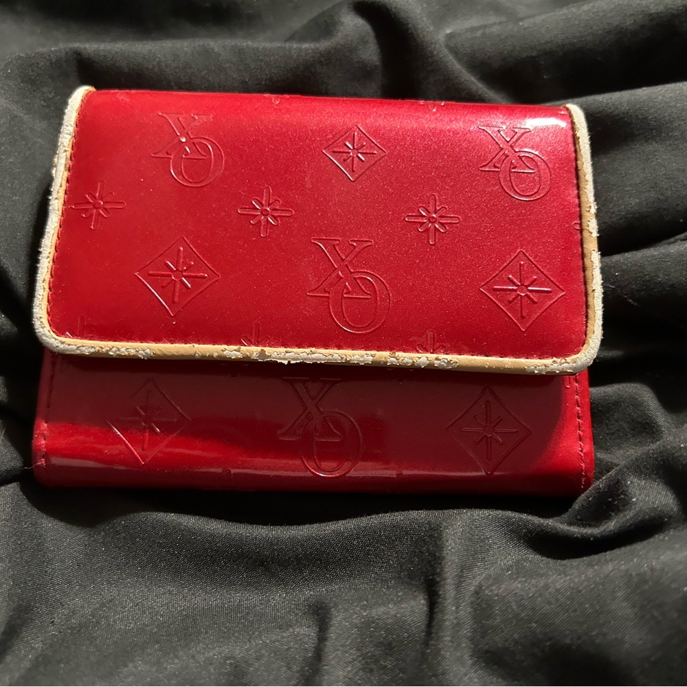 Last Chance Donating next week. Red jelly like wallet/trifold